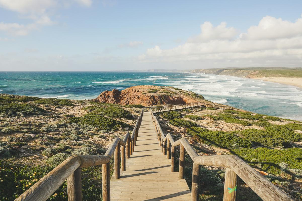 Portugal - Near Faro A photo of a walkway leading to a rugged beach near Faro, Portugal