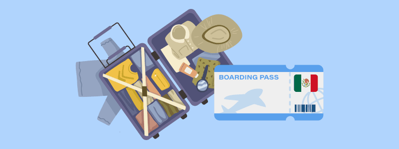 Open suitcase filled with clothes next to a boarding pass to Mexico.